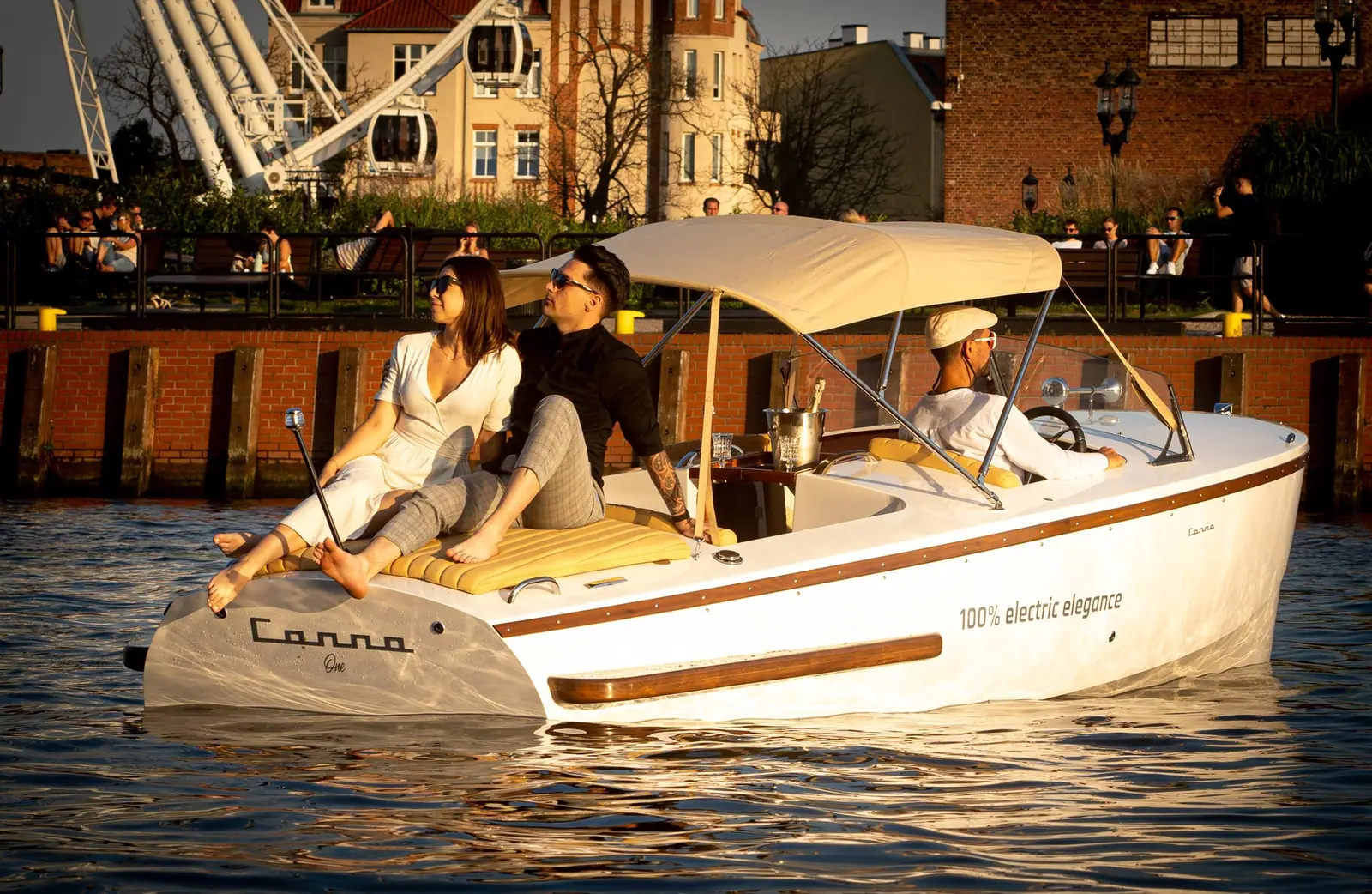 Couple cruising aboard a Canna One electric dayboat
