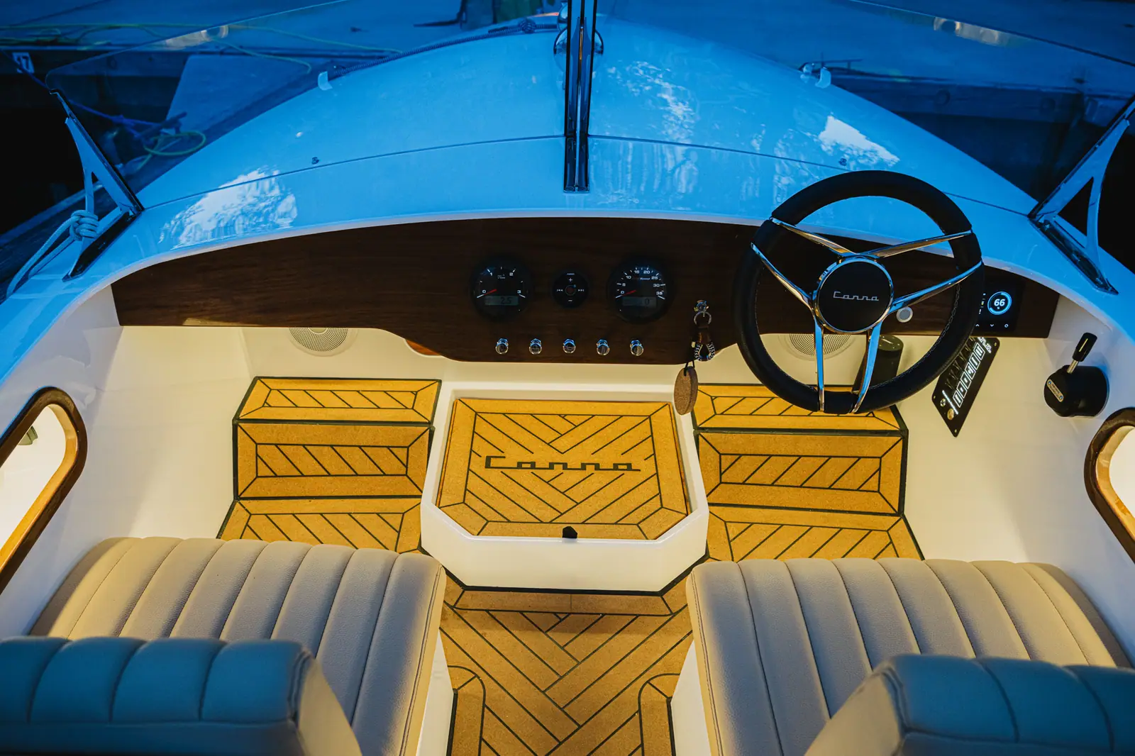 Illuminated Canna One dayboat cockpit at night